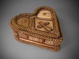 a wooden casket with a heart shaped design on it