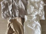 three pieces of clothing laid out on a wooden floor