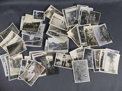 several old black and white photographs of people and horses