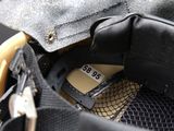 a close up of a pair of shoes inside of a bag