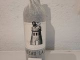 a bottle of wine that is sitting on a table