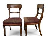 pair of antique chairs with upholstered seat and back