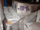 many boxes that are sitting on a pallet in the warehouse