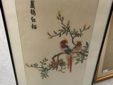 two framed chinese paintings of birds on a branch with flowers