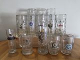 a lot of glasses that are sitting on a table