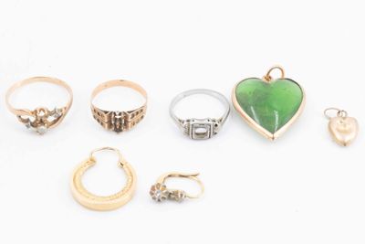an assortment of various rings and rings on a white surface