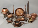 many different types of copperware on the table