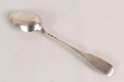 a spoon that is sitting on a table
