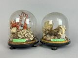 two cloches that are sitting on top of each other