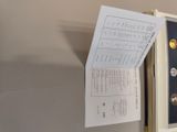 a picture of a paper that is hanging on the wall