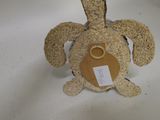 a stuffed animal that has a tag on it
