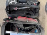 a lot of luggage sitting on the floor next to a pair of shoes