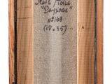 an old picture of a wooden frame with writing on it