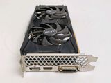 a close up of a video card sitting on top of a white table