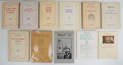 a lot of books that are sitting on a table