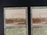 two cards that are sitting on a table