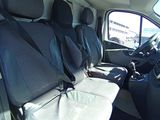four seats in the back of a van with no one in it