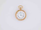 a gold pocket watch with roman numerals and roman numerals