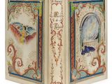 un livre ouvert sur lequel figurent l'image d'un oiseau et un oiseau
