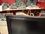 a television that is sitting on a table in a room