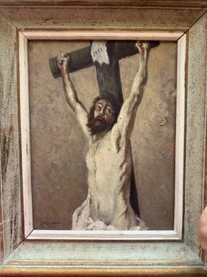 a painting of a man holding a cross above his head