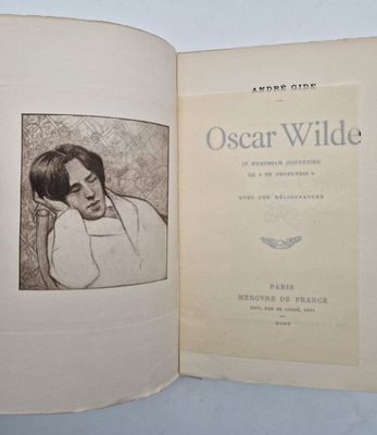 an open book with a picture of a woman on it