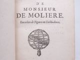 un livre ouvert sur lequel est dessiné un globe terrestre