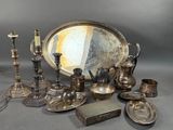 a lot of silver items that are on a table