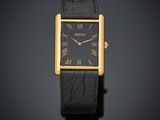 une image montrant un gros plan d'une montre dont le cadran comporte des chiffres romains