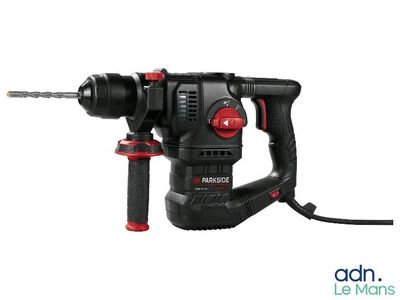 a close up of a drill with a cord attached to it