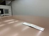 a remote control sitting on a table in a room