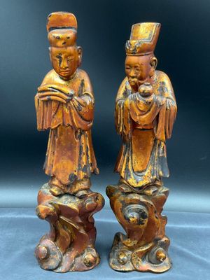 pair of antique chinese figurines of a man and a woman