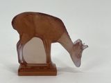 deer figurine on a white background with a white background