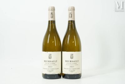 two bottles of white wine sitting next to each other on a white surface