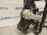 an image of a close up of a machine in a garage