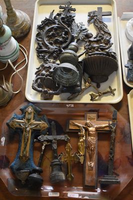 a lot of religious items on the table