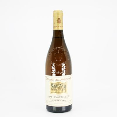 a bottle of wine that is sitting on a table