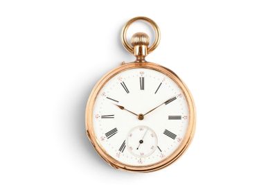 une montre de poche en or avec des chiffres romains sur le cadran