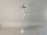 an image of a metal stand with a candle on it