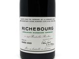 a bottle of wine that is sitting on a table