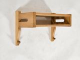 a small wooden table with a shelf on it