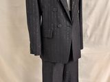 an image of a suit and tie on a mannequin