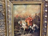 an oil painting of a man riding a horse in a field