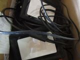 a box that has a couple of lights and cords in it