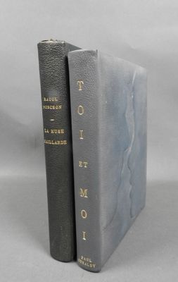 two books sitting on top of each other on a white surface