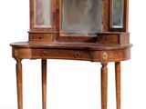 a small table with a mirror on top of it