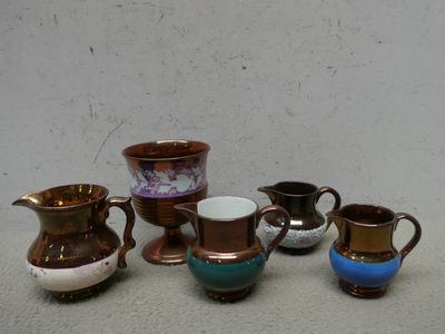 JERSEY - Lot de 4 pichets et un calice en faïence lustrée - H. 6,5 à 1 - Photo 1