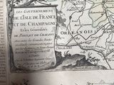 an old map of france with a picture of a boat