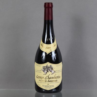 a bottle of wine that is sitting on a table