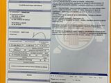 the back of a yellow folder with a picture of a person ' s identification card
